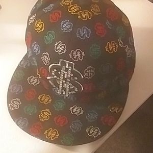 fitted hat with money symbols